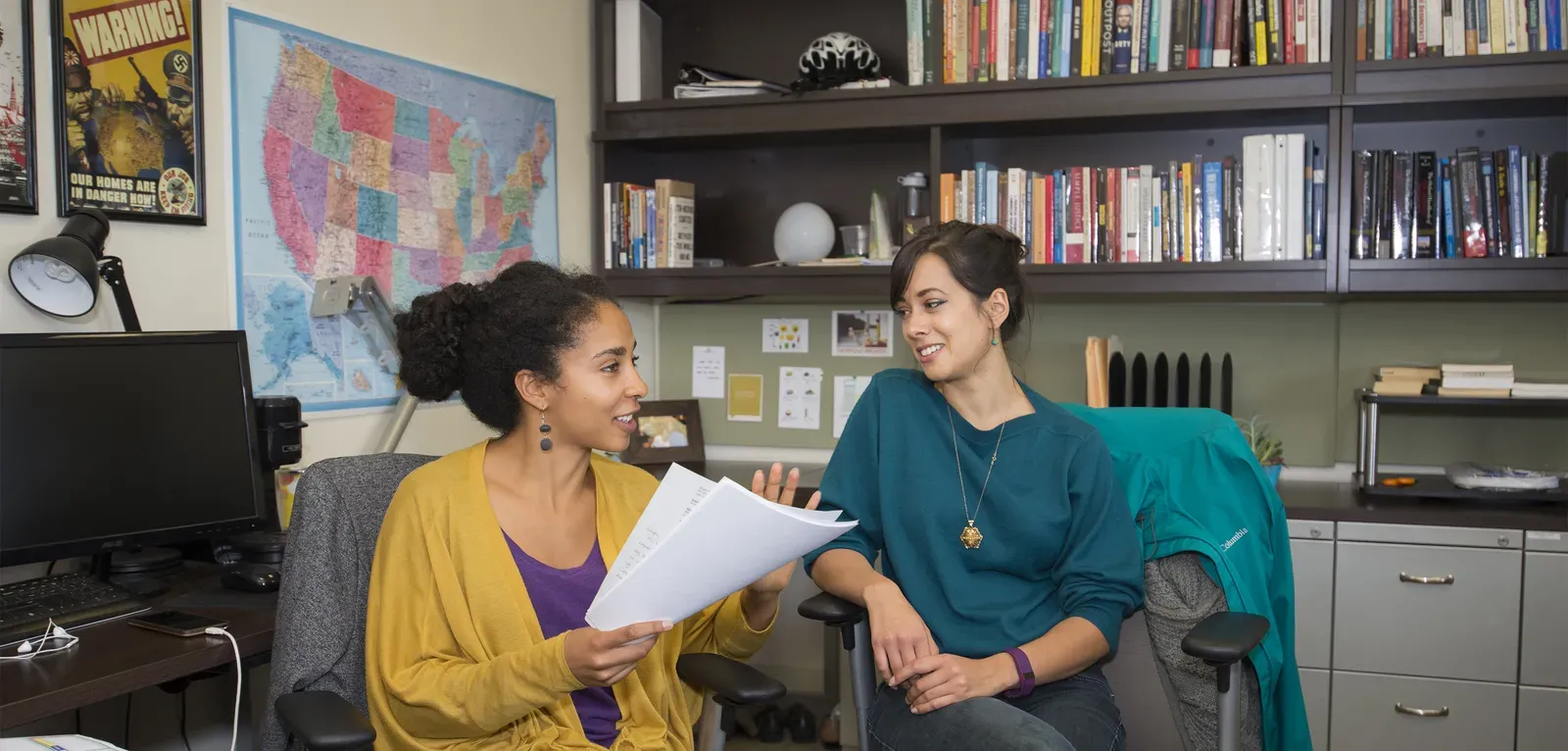 two people in discussion