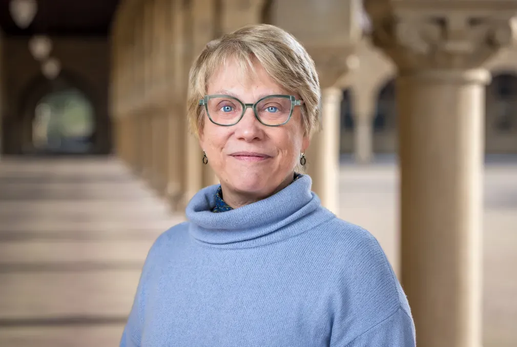 Photo of Martha Cyert wearing a light-blue sweater