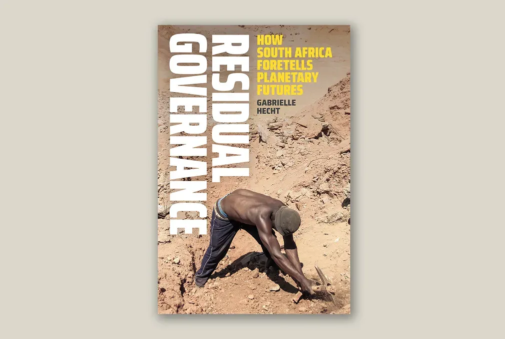 Cover of the book Residual Governance: How South Africa Foretells Planetary Futures showing a Black man bent at the waist using a pickax to mine a rocky area.